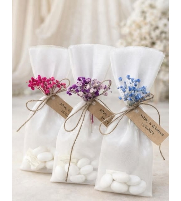 Μπομπονιέρα με ανθάκια σε διάφορες αποχρώσεις.